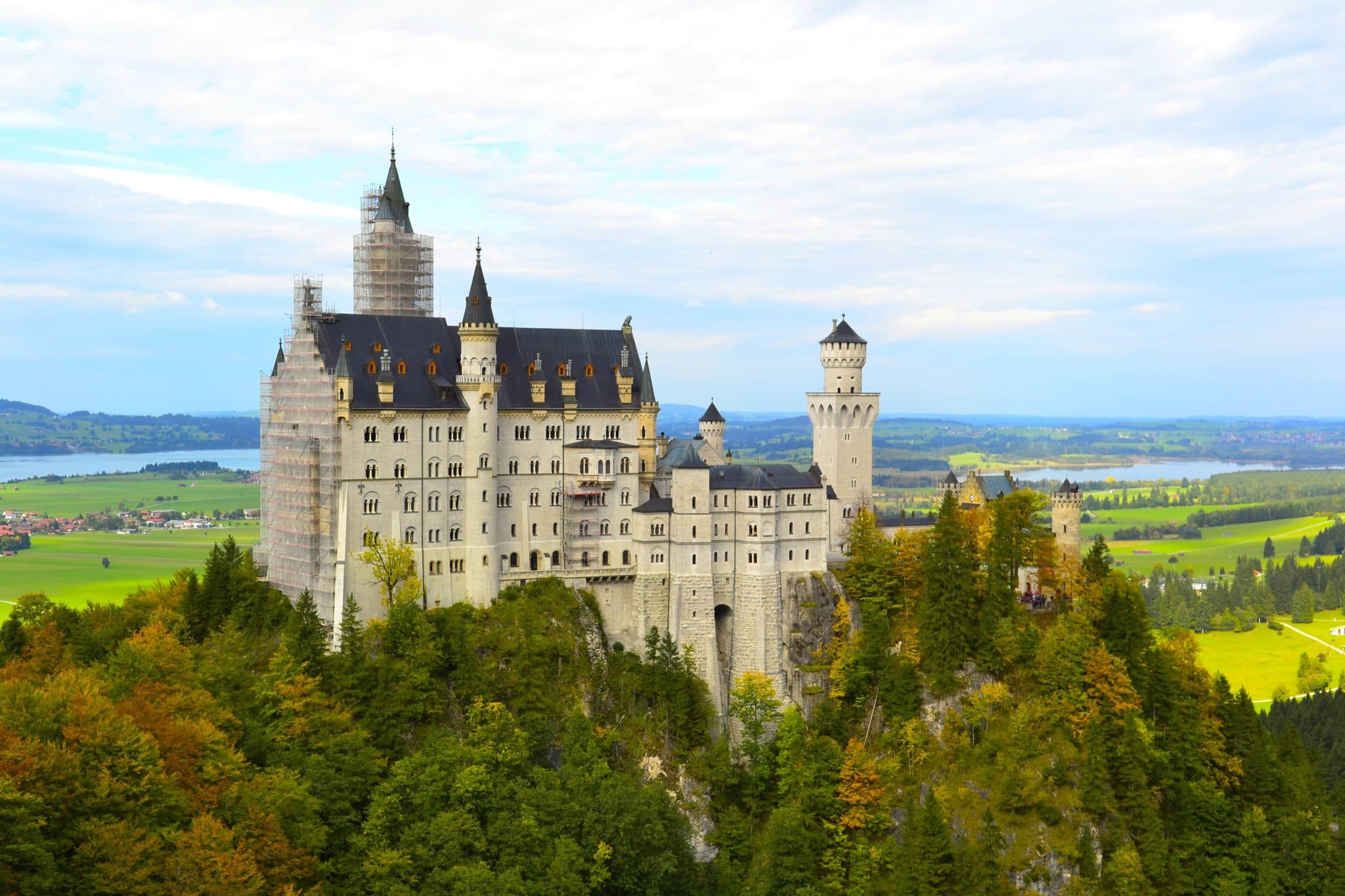 Neuschwanstein Castle framed by the Bavarian landscape.