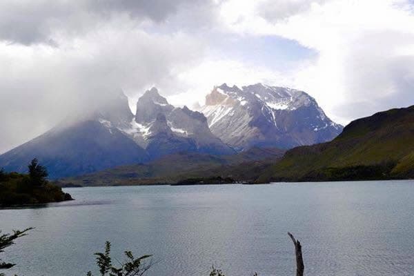 A broad view of the mountains and grasslands in Torres del Paine.